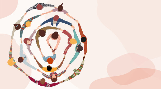 Group of people in circle from diverse culture holding hands.Cooperation and teamwork.Community of friends or volunteers committed to social issues for peace and the environment.Top view