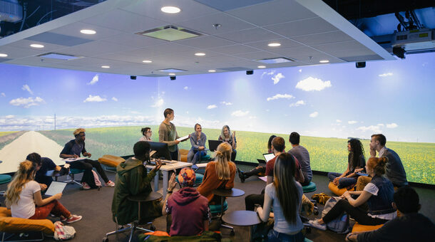 University students in VR classroom with lecturer